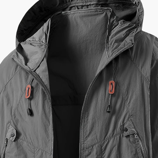 Unisex windbreaker jacket with hood and zip pockets for outdoors