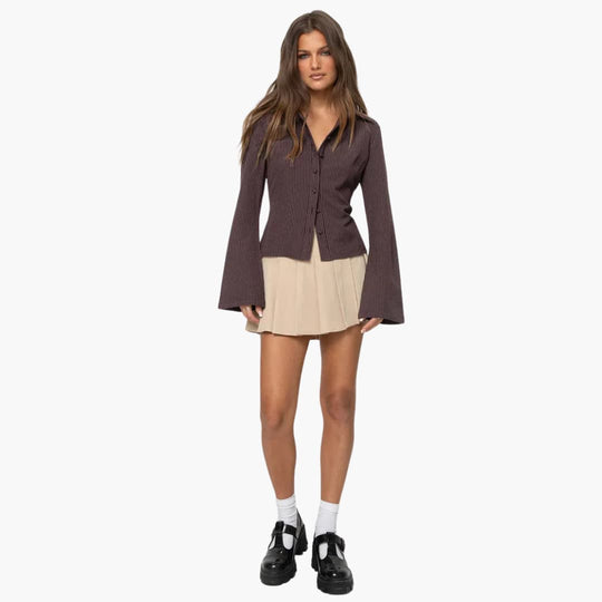 Women’s button-front blouse with flared sleeves and collar