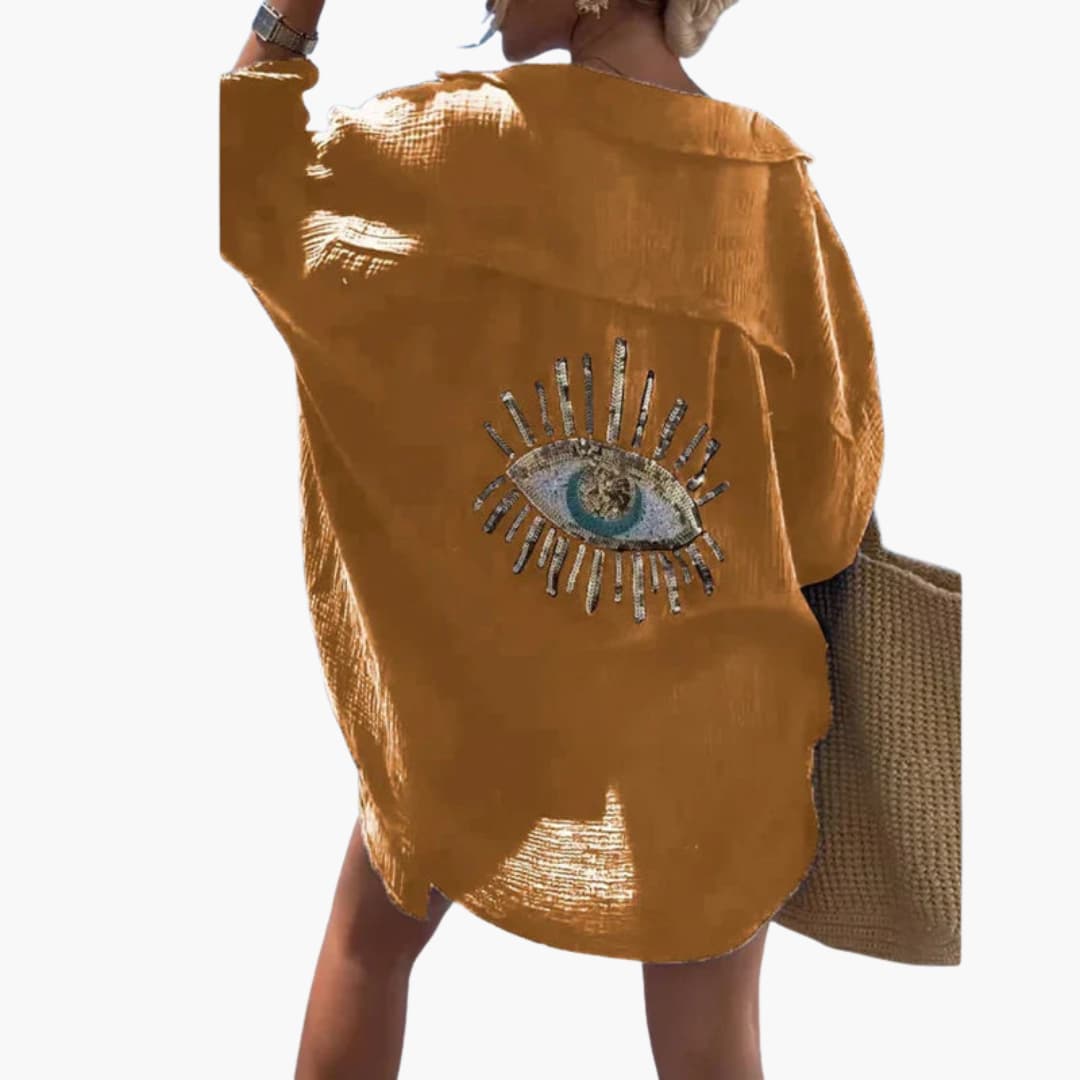 Women’s oversized beach shirt with long sleeves and sheer fabric
