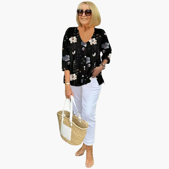 Women’s relaxed-fit blouse with floral print and V-neckline
