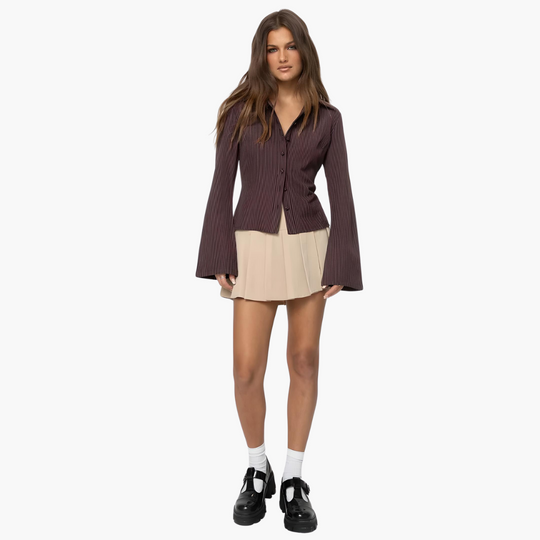 Women’s blouse with flared sleeves and vertical stripes