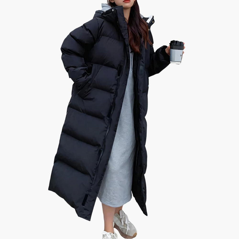 Women's long winter puffer jacket with hood and zip pockets