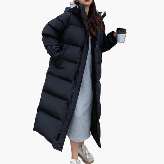 Women's long winter puffer jacket with hood and zip pockets