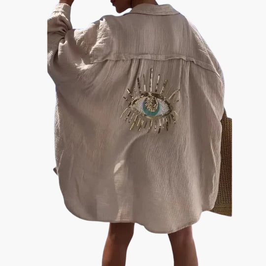 Women’s oversized beach shirt with long sleeves and sheer fabric