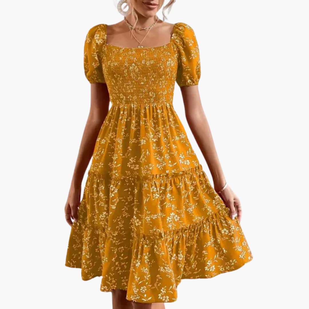 Women's short floral dress with puff sleeves and smocked bodice