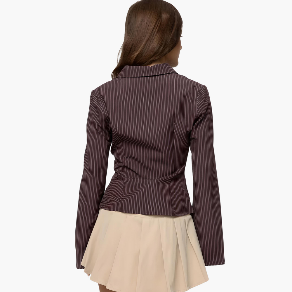 Women’s blouse with flared sleeves and vertical stripes