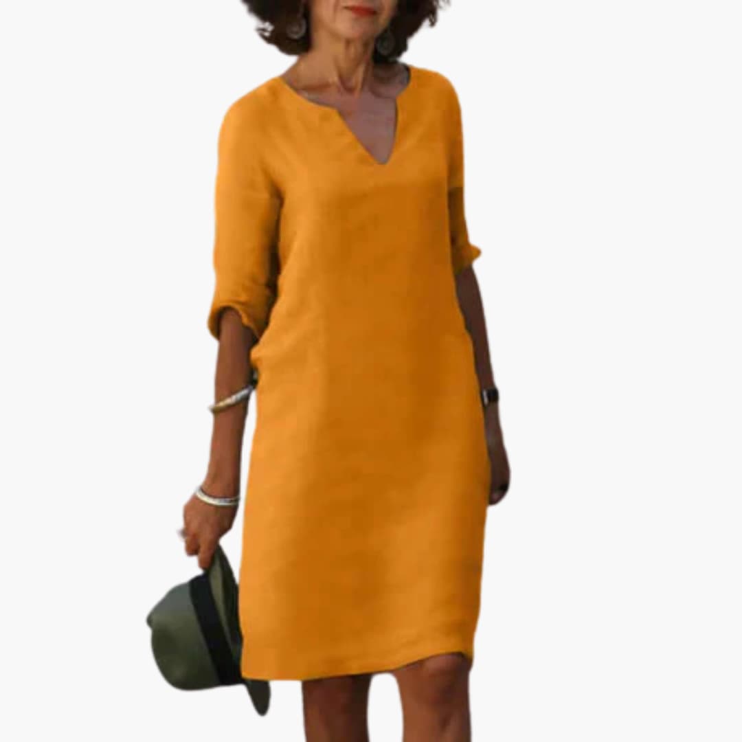 Women’s knee-length dress with V-neck and 3/4 sleeves