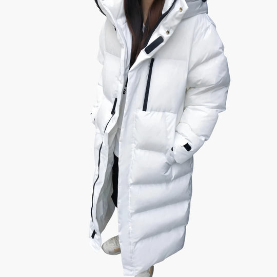 Women's long winter puffer jacket with hood and zip pockets