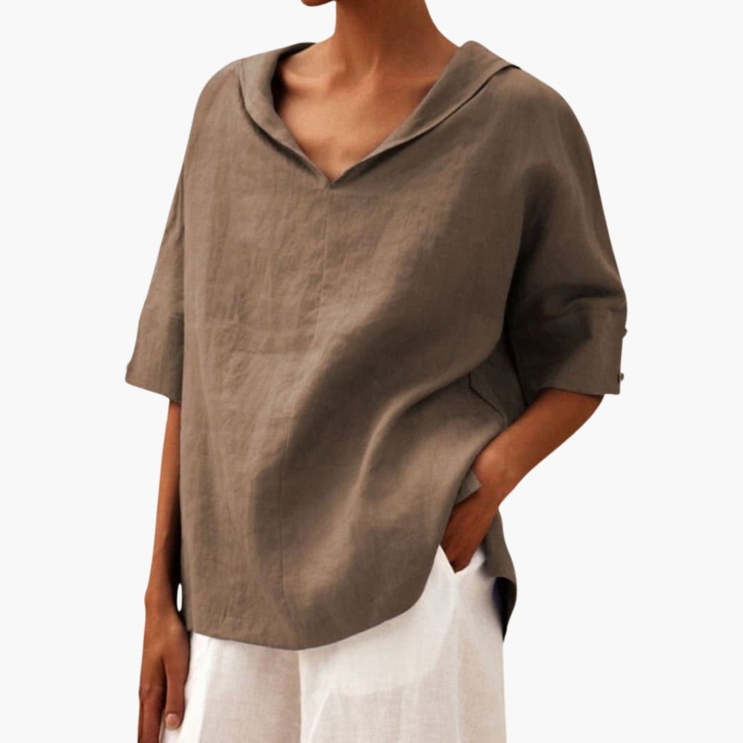 Women’s short sleeve blouse with V-neck and side slits