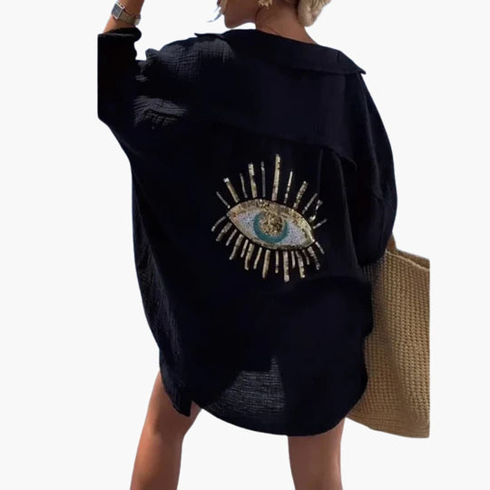 Women’s oversized beach shirt with long sleeves and sheer fabric