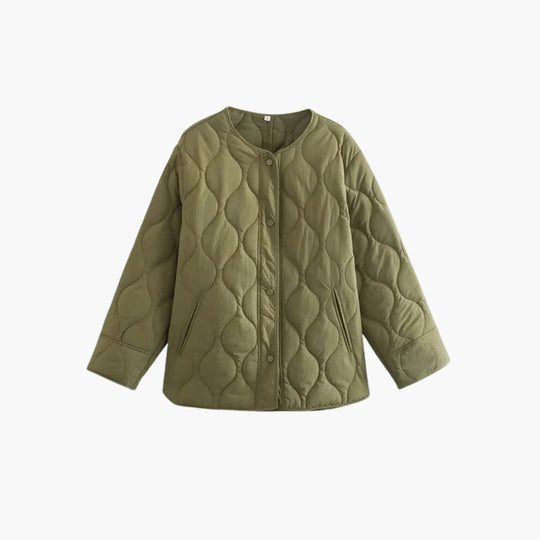 Women's winter puffer jacket with quilted padding and snap closure