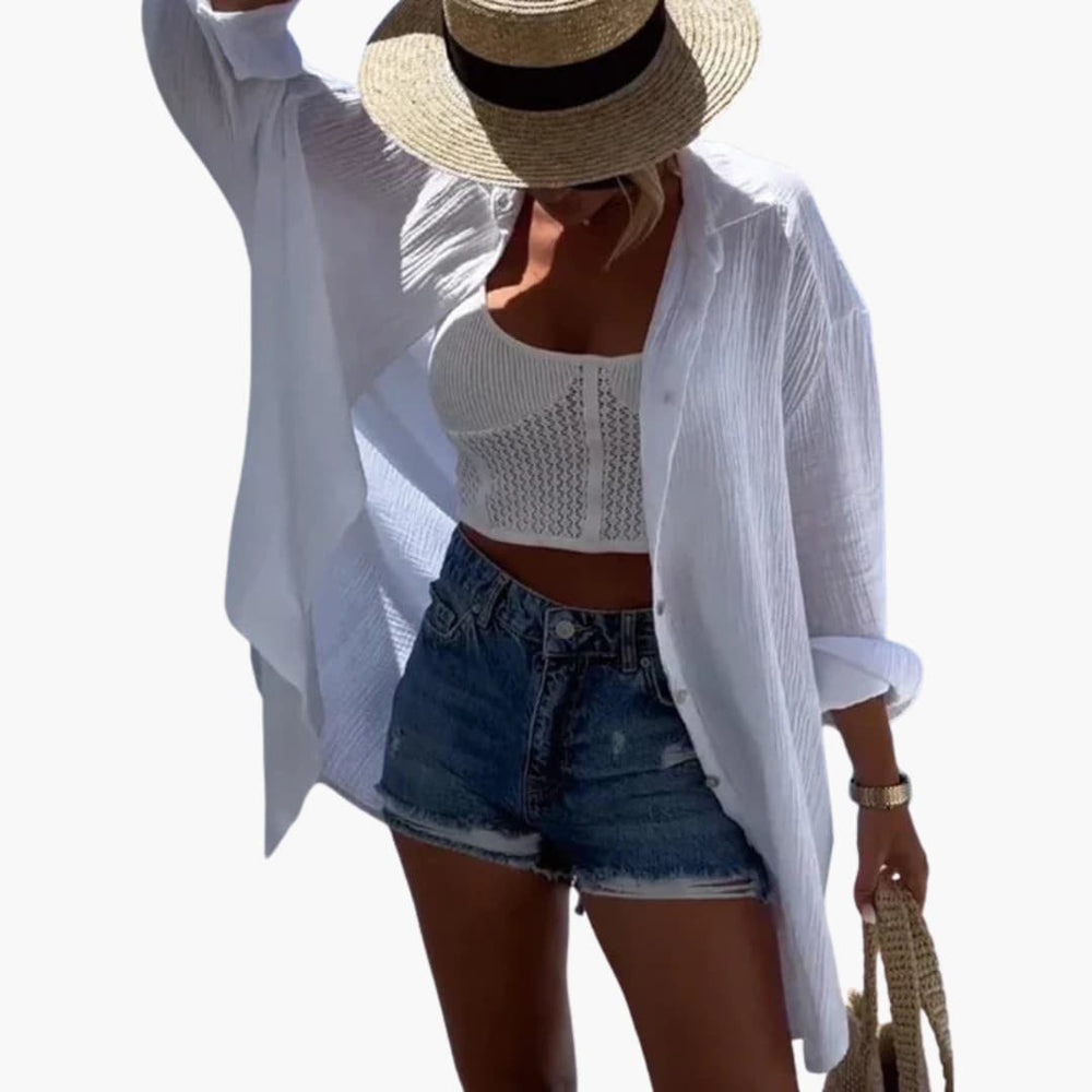 Women’s oversized beach shirt with long sleeves and sheer fabric