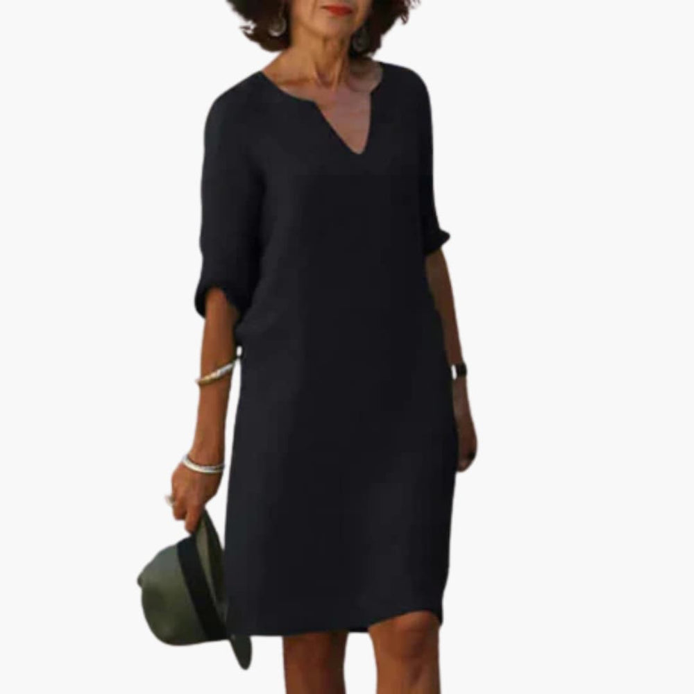 Women’s knee-length dress with V-neck and 3/4 sleeves