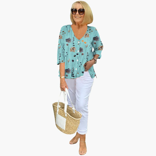 Women’s relaxed-fit blouse with floral print and V-neckline