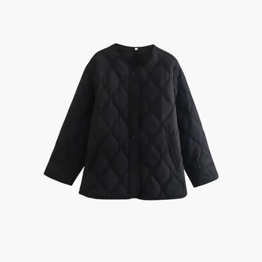 Women's winter puffer jacket with quilted padding and snap closure