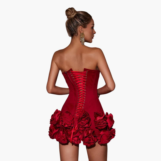 Women’s mini dress with strapless bodice and ruffled skirt