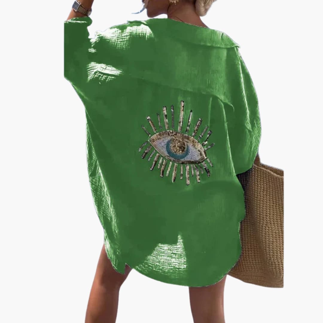 Women’s oversized beach shirt with long sleeves and sheer fabric