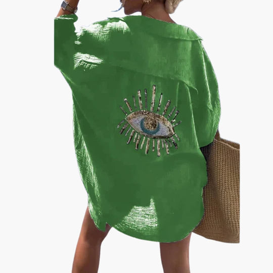 Women’s oversized beach shirt with long sleeves and sheer fabric
