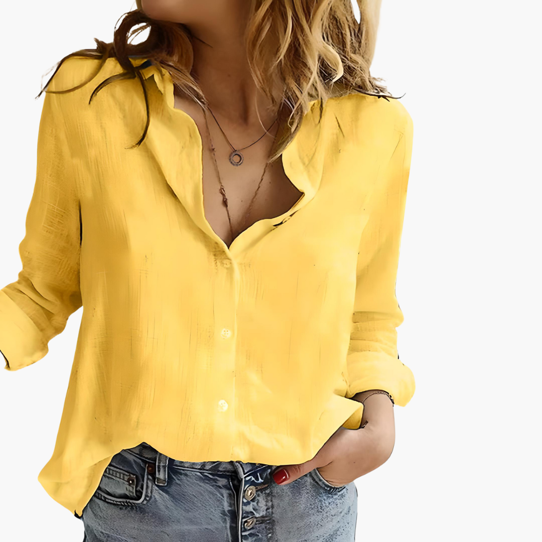 Women’s button down shirt with long sleeves and loose fit