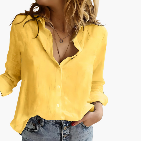 Women’s button down shirt with long sleeves and loose fit