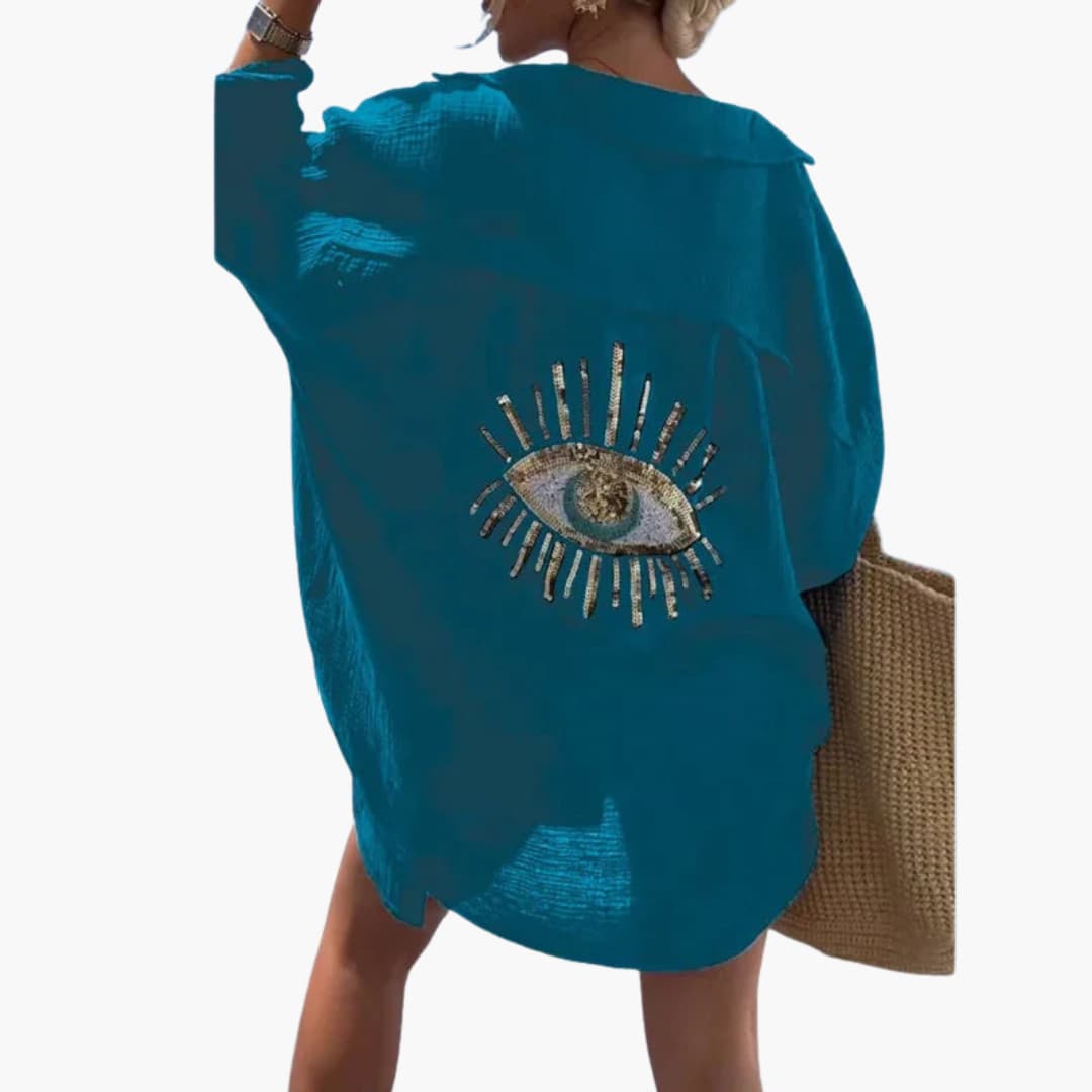 Women’s oversized beach shirt with long sleeves and sheer fabric
