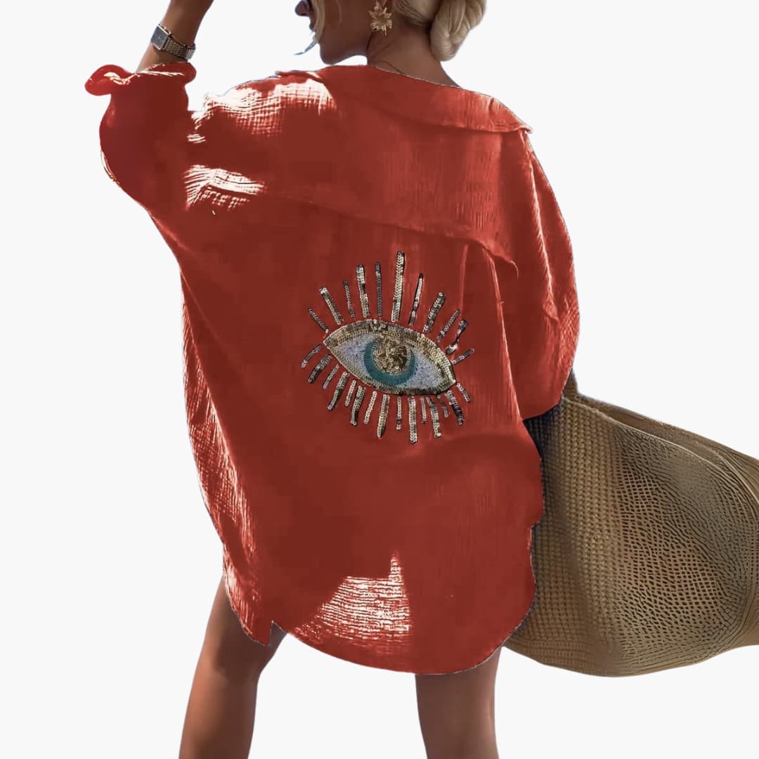 Women’s oversized beach shirt with long sleeves and sheer fabric